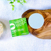 Happy Hippo Shower Spritzers packaging with a green label on a white background