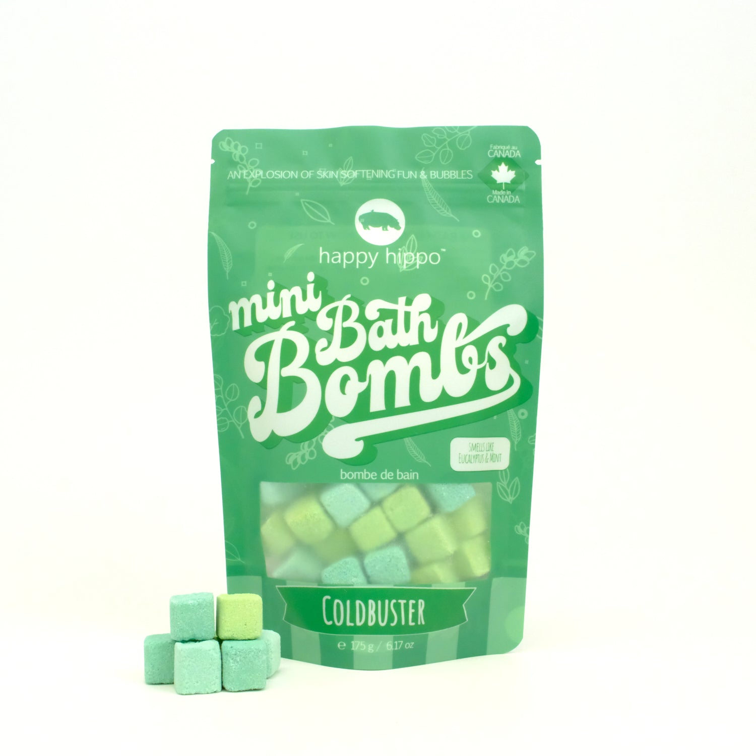 Green Coldbuster Mini Bath Bombs bags on a white background with some mini bath bombs in front of it