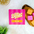 Pink box of Bath Bombs with self-care text on a white background